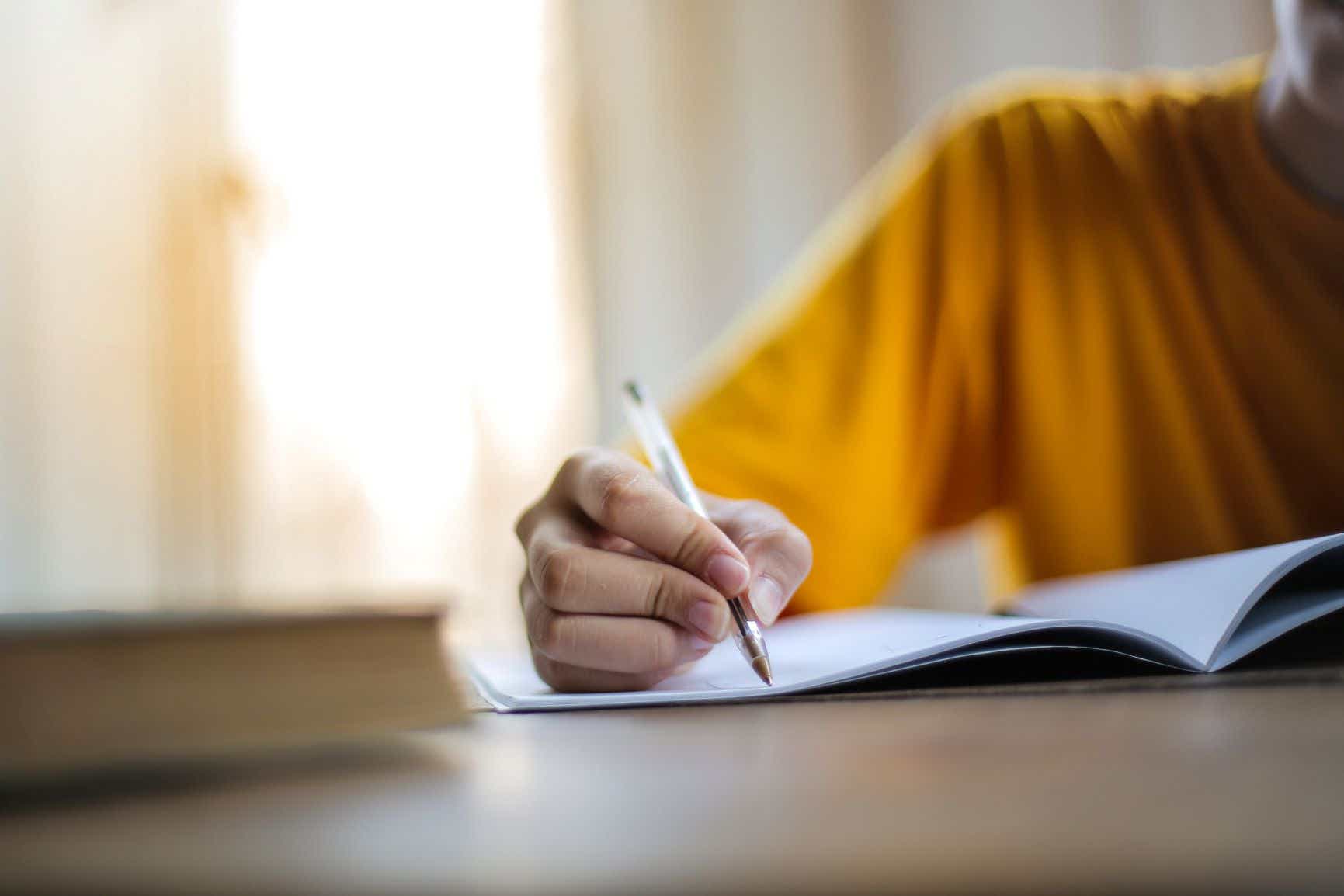 a student taking notes